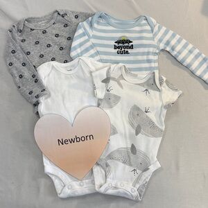 Carter's - set of 4 newborn onesie tops/shirts.